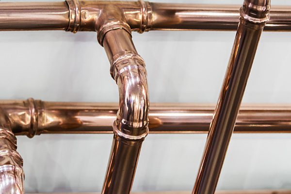 copper-pipes-fittings-carrying-out-plumbing-work